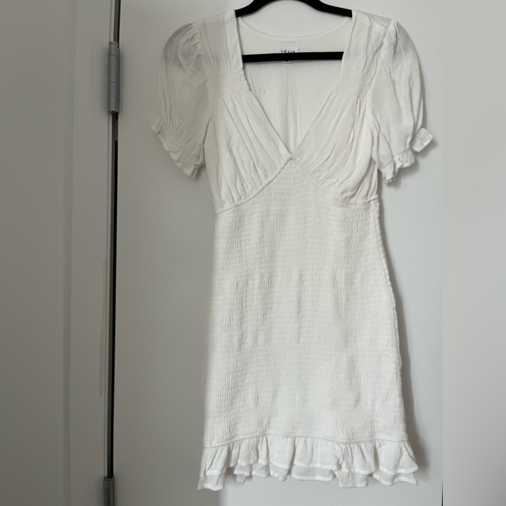 White dress flattering stretch fabric, smocked style